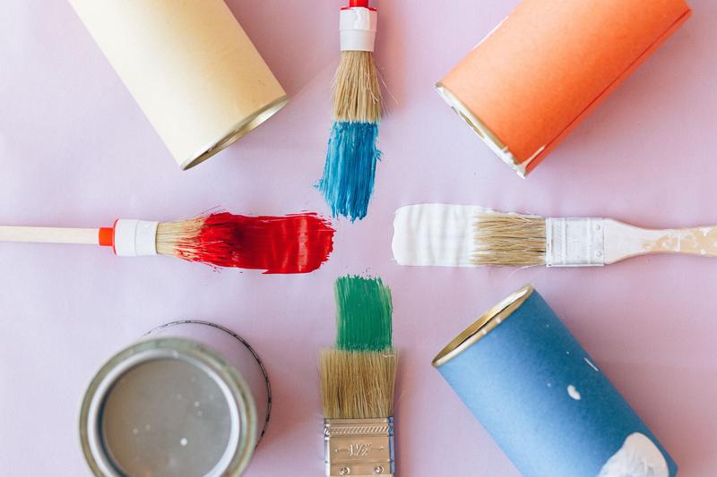 Paint brushes and open paint cans
